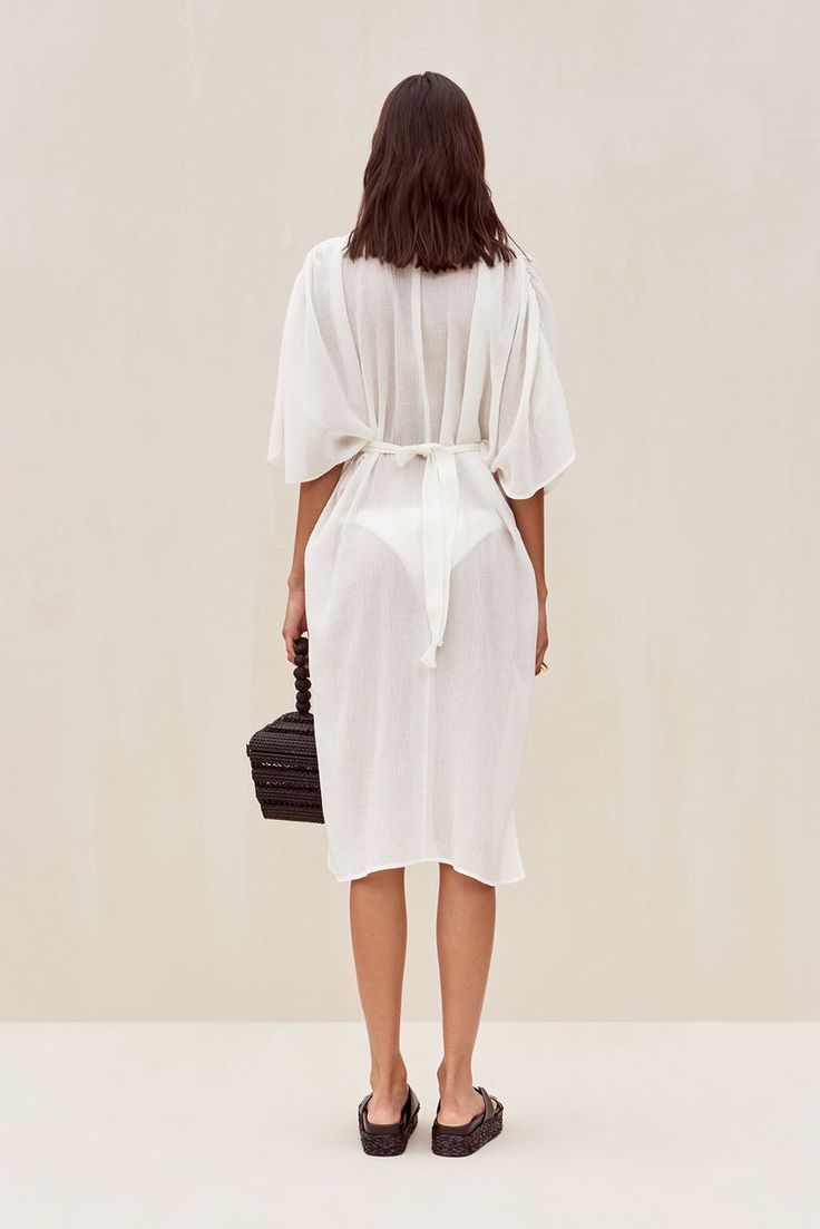 INGA COVERUP - OFF WHITE – CULT GAIA Beachwear Wrap Cover-up With Tie Waist, Bohemian V-neck Tie Waist Cover-up, Chic Wrap Cover-up For Loungewear, Spring Beachwear Kaftan With Tie Waist, Summer Beachwear Kaftan With Back Tassel Tie-up, Summer Open Front Daywear Cover-up, Elegant Open Front Summer Cover-up, Beach Cover-up Kaftan With Tie Waist, Spring Beach Cover-up Kaftan With Tie Waist