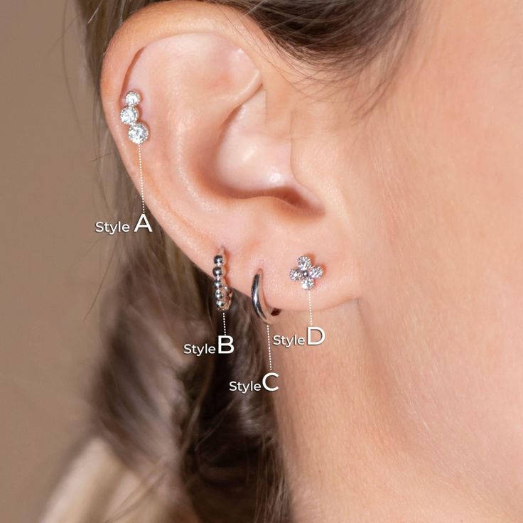 Overview: This minimalist earring set, crafted entirely from 14k solid gold, offers a timeless combination of styles perfect for those who love curated ear looks. It features classic huggie hoops and stud earrings, both designed for multiple piercings, including lobe, conch, cartilage, helix, and tragus.  Made with real gold, this gift set ensures long-lasting wear and a touch of elegance. The simple design makes it suitable for everyday wear, and it comes ready to gift in a beautiful package, m Classic Hypoallergenic Ear Climbers As A Gift, Minimalist 14k White Gold Piercings, Classic Hypoallergenic Ear Climbers As Gift, Classic Hypoallergenic Ear Climbers For Gifts, Minimalist White Gold 14k Piercings, Elegant Small Hoop Piercings, Tarnish Resistant, Elegant Hypoallergenic Hoop Piercings, Minimalist Huggie Piercings For Anniversary, Delicate 14k Gold Piercings For Everyday