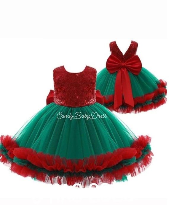 All dresses are made as mother and daughterPlease ask for color option.The dress is made in 1  or 2  day This Customise Kids Couture is completely made of health-safe and kid-friendly materials. Inner parts are 100% cotton and outer parts are sewed with high quality sequin and tulle.Dress is made to order in any size. If you want it to fit perfectly, please, send me the measurements of your daughter and I will sew the dress according to the measurements.Please follow the page.Take care of yourse Festive Red Princess Dress For Dress-up, Green Christmas Princess Dress For Dress-up, Red Princess Dress For Christmas Dress-up, Cute Red Holiday Dress For Dress-up, Green Princess Dress For Birthday And Christmas, Fitted Red Princess Dress For Birthday, Red Fitted Princess Dress For Birthday, Red Holiday Dress With Red Bow, Holiday Red Dresses With Red Bow