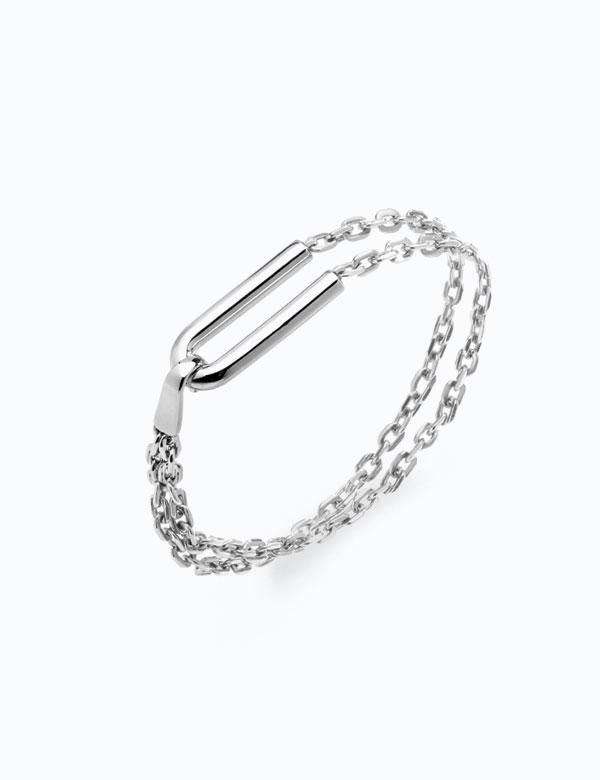 All for you. This dual chain link sterling silver bracelet features and U shaped element to lock the piece together for easy wear. Perfect for layering. ¶ White Silver Luxury Metal Chain Bracelet With Box Chain, Luxury Elegant Chain Bracelet With Oxidized Finish, Luxury Nickel-free Bracelets As Gift, Luxury Modern Box Chain Bracelets, Luxury Silver Chain Bracelet Jewelry, Luxury Unique Silver Chain Bracelet, Luxury Silver Stainless Steel Chain Bracelet, Luxury Silver Jewelry With Silver-tone Hardware, Luxury Modern Rectangular Chain Bracelet