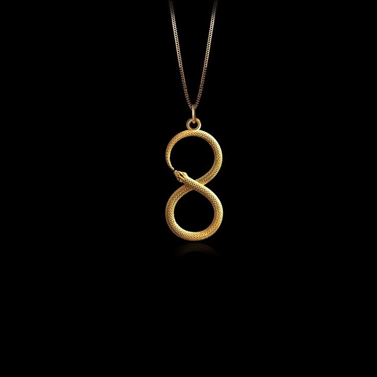 PENDANT INFORMATIONThis pendant is made of real, solid gold.• Made in USA• Size: MINI• Material: 14k or 18k solid gold• Finish: polished• Height: 1.1" (27,5 mm) x Width: 0.5" (13 mm)• Pendant weight (approx.): 3 grams (14k)• Bail: fits up to 4 mm chains• Solid back, not hollow• A certificate of authenticity is included• Delivered in our elegant jewelry box, making it the perfect giftPlease note: Our Mini sized pendants are small and delicate pieces - please verify the dimensions before placing y 14k Gold Infinity Jewelry For Formal Occasions, Formal 14k Gold Infinity Jewelry, Gold Infinity Jewelry Tarnish Resistant, Tarnish Resistant Gold Infinity Jewelry, Minimalist Engraved Infinity Jewelry, 14k Gold Infinity Jewelry, Elegant Engraved Snake-shaped Jewelry, 14k Yellow Gold Snake-shaped Jewelry, 14k Gold Infinity Jewelry Tarnish Resistant