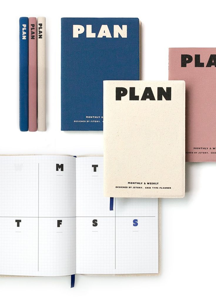 three notebooks, one with the word plan on it