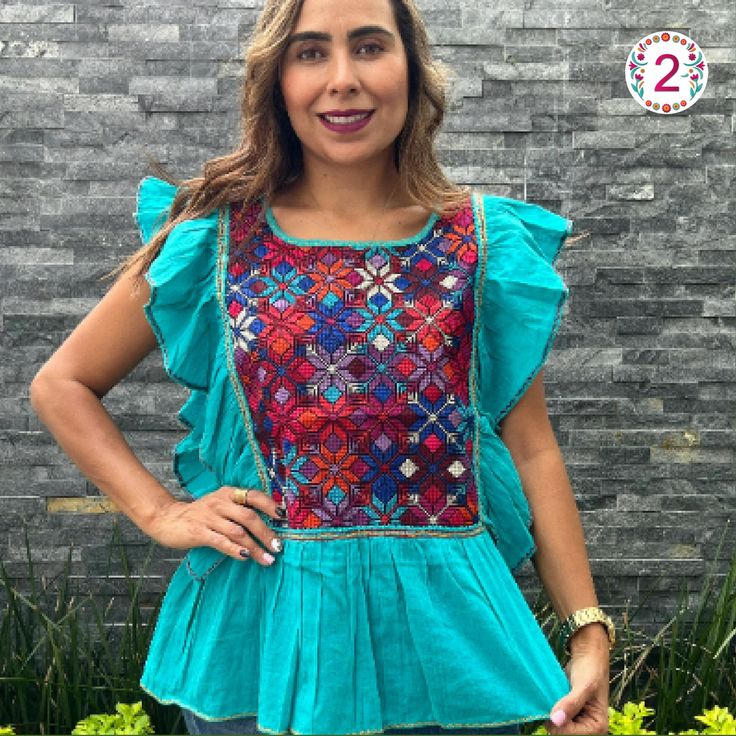 Beautiful Blouse, made with 100% cotton blanket, dyed in bright colors. The ruffles that distinguish this blouse are made by hand, by artisans from Chiapas. Beautiful blouse, you can use it with jeans, leggings, skirts, it is a very elegant blouse and has a beautiful and fine embroidery About Our Items: Each one of our items are handmade/hand woven by Indigenous communities of Chiapas and Oaxaca in Mexico. Great care has been taken to ensure the quality of uniqueness of each item we sell.  Our items are made of cotton. Each flower on each item will be a bit different as they were embroidered carefully by hand. Care Instructions: Please take care to handwash your items in cold water and hang to dry. Green Cotton Blouse With Patchwork, Green Cotton Patchwork Blouse, Green Patchwork Cotton Blouse, Casual Cotton Shirt With Chikankari Embroidery, Festive Blue Tops With Motifs, Casual Tops With Multicolor Embroidery And Motif, Traditional Green Cotton Shirt, Festive Multicolor Top With Chikankari Embroidery, Traditional Multicolor Cotton Embroidered Top