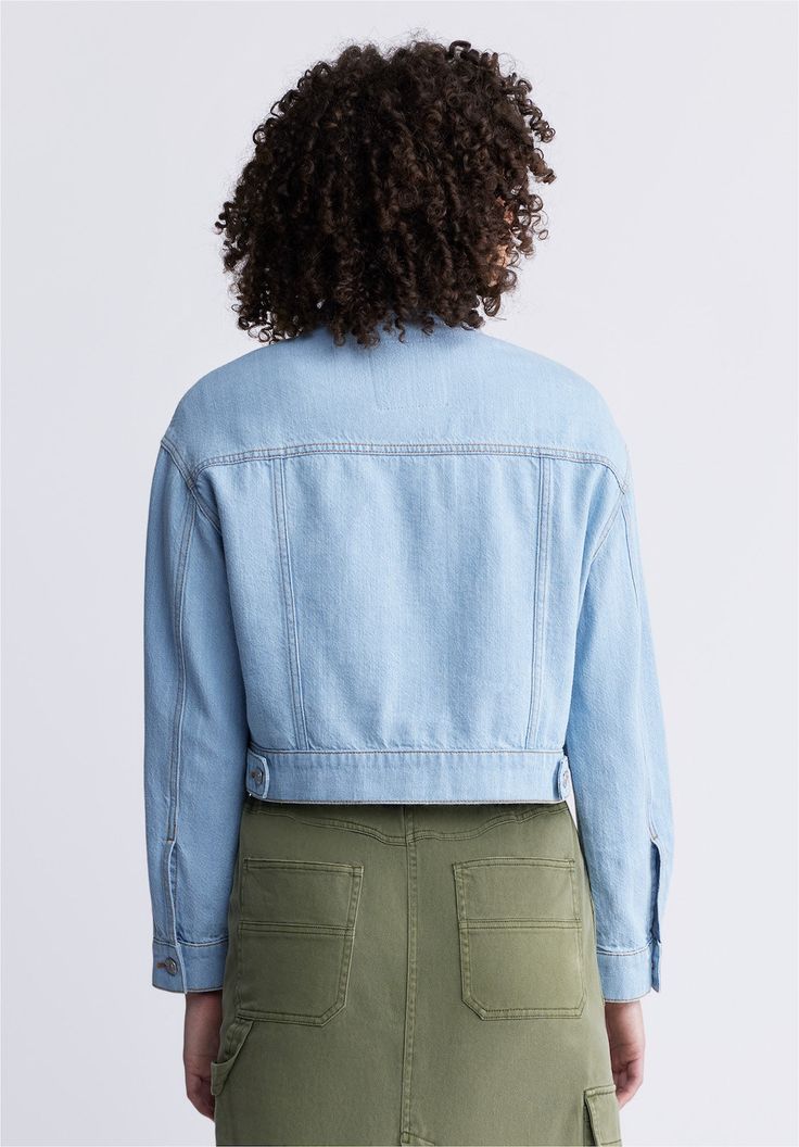 The Teagan is a long-sleeve boxy denim jacket. It shows 2 large flap pockets on the chest and is cropped for the warmer months. The bleached and contrasted wash will give you that vacation feel all summer long.Button closure, spread collar. Trendy Cropped Denim Top With Pockets, Cropped Washed Denim Jacket, Blue Cropped Cotton Denim Jacket, Fall Cropped Jacket In Medium Wash With Pockets, Medium Wash Cropped Cotton Denim Jacket, Cropped Medium Wash Cotton Denim Jacket, Blue Cropped Denim Jacket, Spring Cropped Denim Top With Pockets, Cropped Light Wash Denim Jacket