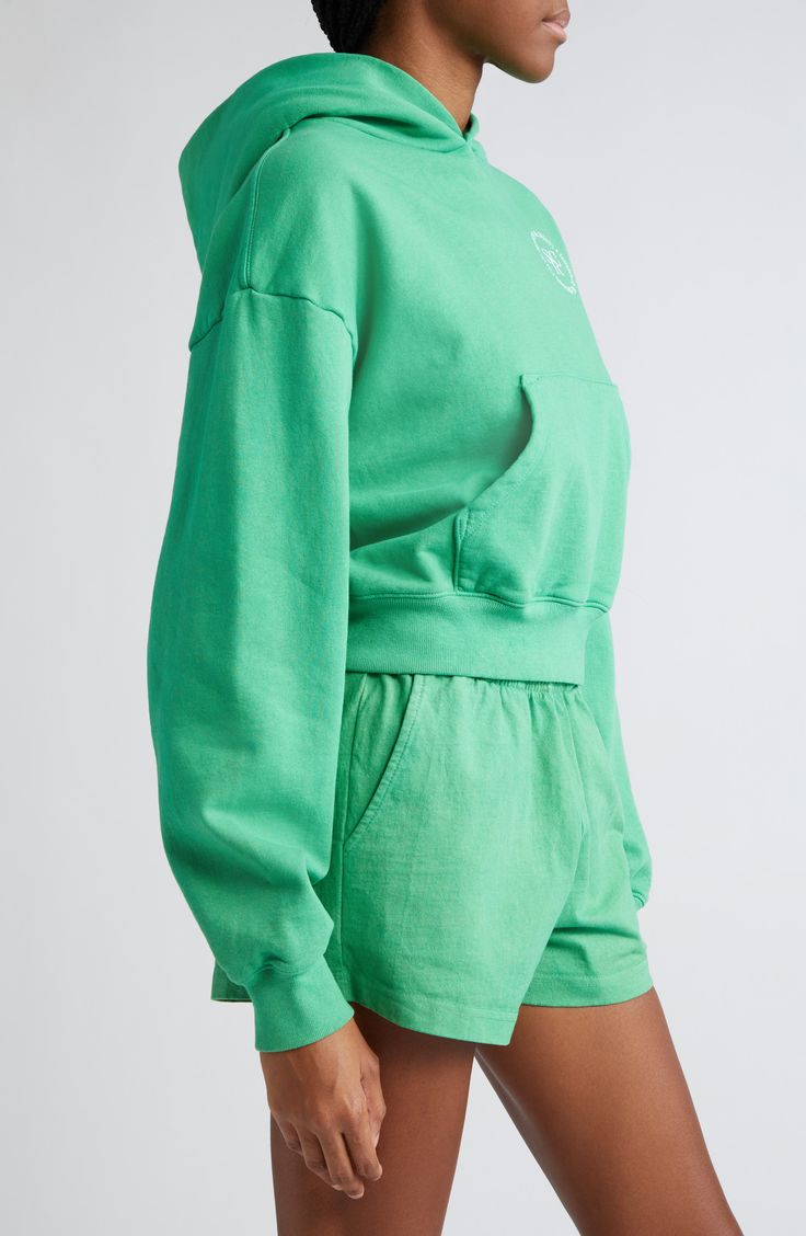 Kick back in the all-cotton comfort of this cropped hoodie rendered in a trending shade of green. 20" length (size Medium) Fixed hood Kangaroo pocket Ribbed cuffs and hem 100% cotton Machine wash, tumble dry Made in the USA Sporty Green Everyday Hoodie, Luxury Green Sporty Hoodie, Green Sporty Cropped Cotton T-shirt, Green Cotton Sporty Cropped T-shirt, Green Moisture-wicking Sporty Sweatshirt, Baby Gear Essentials, Hairstyling Products, Sporty And Rich, Kick Backs