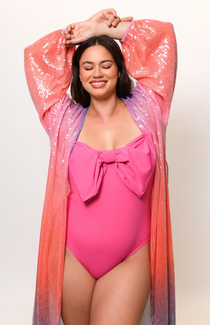 Maxi length cover-up Can be worn as a swim coverup or layering piece Long sleeve Sheer fabric Tie at waist for closure Fabric: Sequin Mesh HPS: 51" Dry clean only Beachwear Wrap Cover-up With Tie Waist, Beachwear Wrap Cover-up For Loungewear, Beachwear Cover-up Wrap For Loungewear, Beachwear Wrap Cover-up, Chic Long Sleeve Poolside Cover-up, Chic Beach Season Cover-up With Tie Waist, Summer Long Sleeve Pool Cover-up, Summer Long Sleeve Cover-up For Pool, Long Sleeve Summer Cover-up For Pool