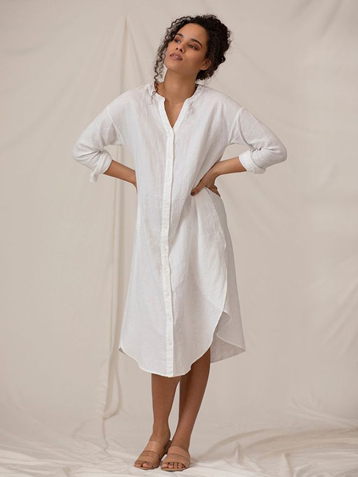 Beautiful linen classic shirtdress is just what we need this spring and summer. Refined and casual, the soft relaxed fit is perfect at home, at the beach, or around town with a few accessories. Features Mandarin collar, v-neck, button front, button cuffs, back box pleat, and lovely curved hemline. Relaxed Fit Shirt Dress With Roll-up Sleeves For Daywear, Elegant V-neck Relaxed Fit Shirt Dress, Casual Summer Shirt Dress With Roll-up Sleeves, Summer Workwear Shirt Dress With Button Cuffs, Chic Summer Shirt Dress With Rolled Sleeves, Spring Linen Button-up Dress For Day Out, Spring Button-up Linen Dress For Day Out, Cotton Shirt Dress With Roll-up Sleeves For Summer, Spring Shirt Dress With Button Cuffs And Shirttail Hem