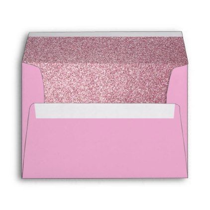 a pink envelope with glitter on it