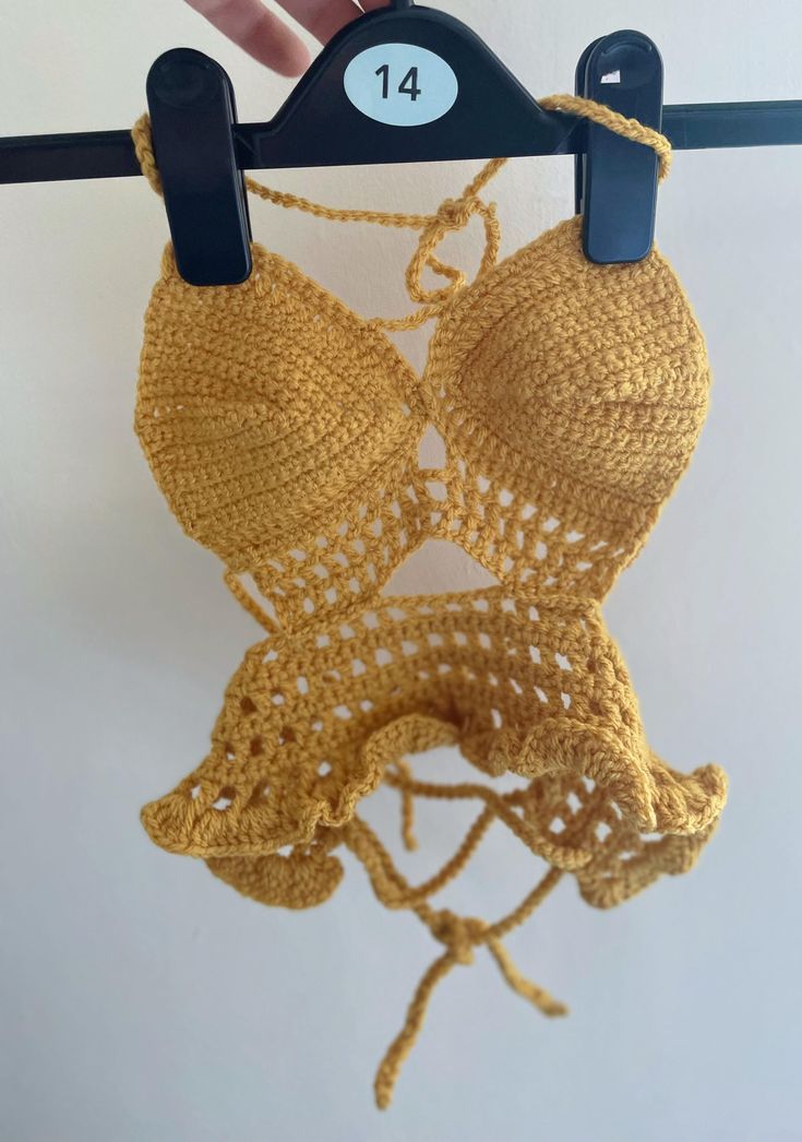 If your looking for a mustard crochet crop top then your in the right place! The lace back on this piece is absolutely stunning! You can tie this to suit your required fit! We offer this in a size 8-16, if you do require a size not listed please get in touch and we will try our best to honour your request. Please message for custom make in choice of colours Fitted Yellow Crochet Top For Summer, Summer Fitted Crop Top With Crochet Trim, Lace Cropped Top For Beach, Lace Crop Top For Summer Vacation, Yellow Fitted Crochet Top For Vacation, Fitted Crochet Trim Crop Top For Summer, Yellow Crochet Top For Vacation And Summer, Yellow Crochet Top For Summer Vacation, Yellow Cotton Crochet Top For Vacation