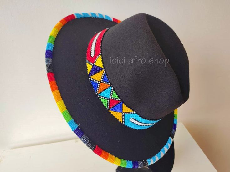 This spectacular unisex high quality fedora hat that is hand beaded on the BRIM . Our hats work beautifully with our handcrafted beaded jewelry that will match very well. Head circumference can fit a size: 57/58cm   EXPRESS SHIPPING VIA DHL express. Beaded Hats, Fedora Fashion, Hats Fedora, Beaded Hat Bands, Handcrafted Beaded Jewelry, Hat Bands, African Accessories, Beaded Hat, Embroidered Hats