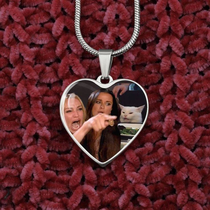 "Woman Yelling At Cat Luxury Heart Necklace. Funny and original gift idea. Purchase This Best-seller and We Guarantee It Will Exceed Your Highest Expectations! ➜ Our patent-pending jewelry is made of high quality surgical steel with a shatterproof liquid glass coating and 18k gold finish option. ➜ Our jewelry is personalized in the U.S.A by awesome working moms just like yours! We hire and train working mothers and pay a living wage. We are proud to support strong communities and keep jobs in Am Woman Yelling At Cat, Woman Yelling, Italian Pride, Necklace Woman, Cat Heart, Funny Gift Idea, Dog Day, Luxury Necklace, Glass Coating