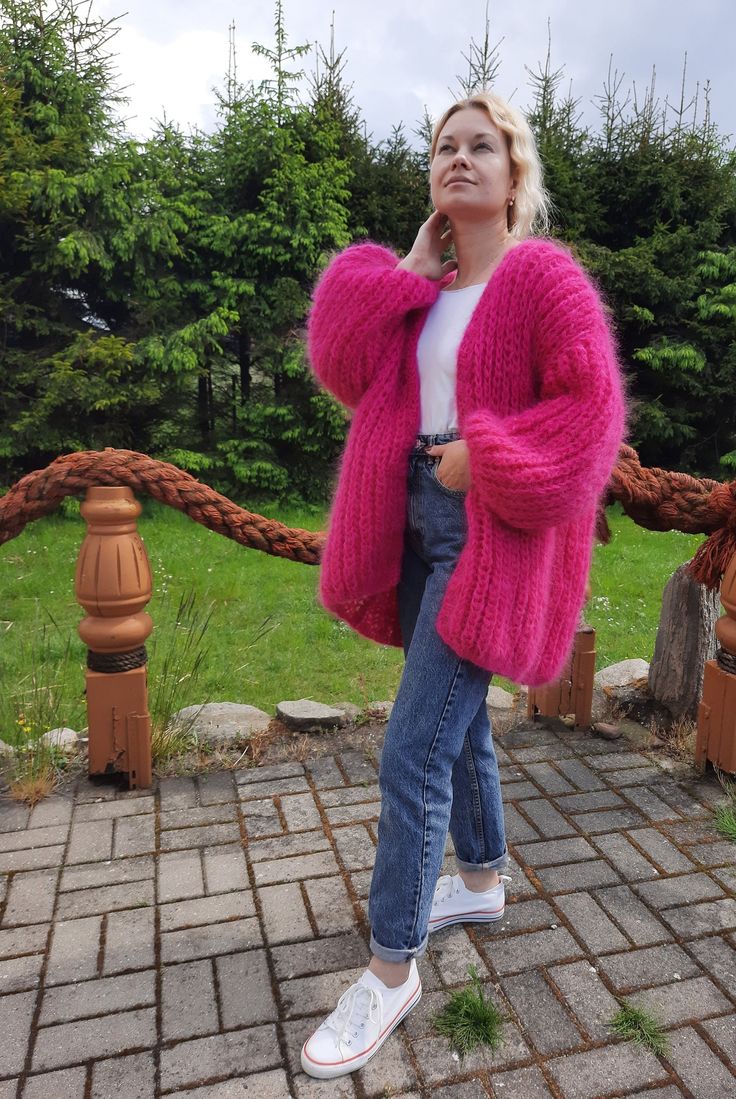 "Soft cozy warm mohair oversized cardigan, mohair cardigan, knitted cardigan, handknitted cardigan, fluffy cardigan, woolen cardigan, mohair pink cardigan, fuchsia mohair cardigan, fuchsia woolen cardigan. Soft, warm wool cardigan, chunky knit and trendy fuchsia color will not leave you indifferent. Pairs well with jeans and light outfits. It is possible to manufacture the same cardigan in any size, as well as in any other color that is in the palette in the photos. The term of production is 5-7 Luxury Pink Cardigan For Fall, Affordable Pink Oversized Outerwear, Cheap Pink Knitted Outerwear, Shop Pink Knitted Long Cardigan, Cheap Cozy Pink Cardigan, Red And Pink Cardigan Outfit, Luxury Pink Winter Cardigan, Pink Fluffy Cardigan Outfit, Cheap Chic Pink Cardigan