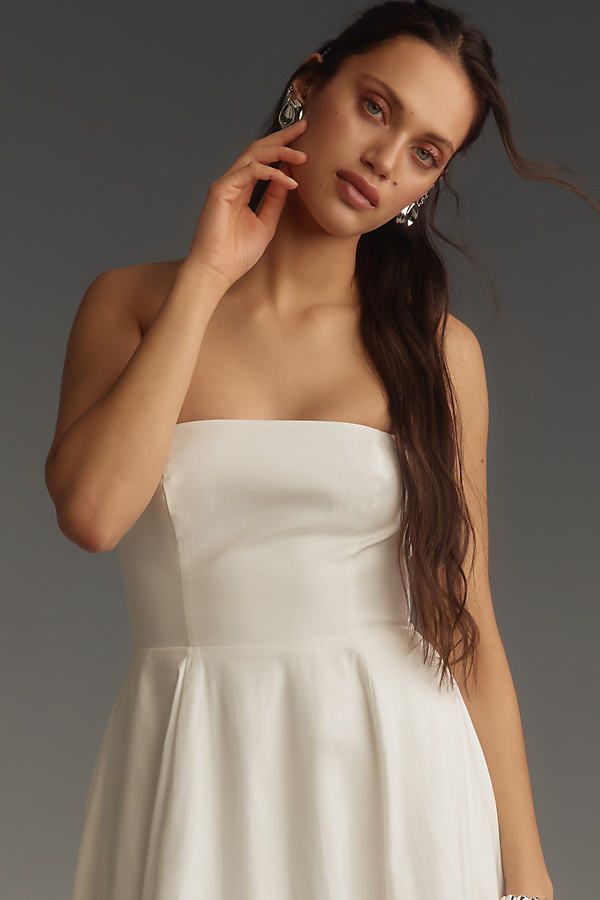 Ooooh aaaaah, that's Astoria: The strapless dress that turns heads and makes the cold shoulder look hot, hot, hot. | Astoria Midi Dress by Reformation in White, Women's, Size: 8, Cotton/Elastane at Anthropologie Formal Dress With Sweetheart Neckline And Built-in Bra, Elegant Strapless Dress With Built-in Bra For Night Out, Glamorous Evening Dress With Built-in Bra, Strapless Cocktail Dress With Fitted Bodice, Strapless Dress With Fitted Bodice For Cocktail, Off-shoulder Gala Dress With Corset Back, Elegant Bandeau Corset Dress With Boned Bodice, Strapless Fitted Maxi Dress, Elegant Off-shoulder Dress With Corset Back