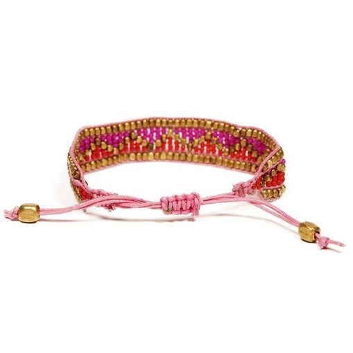 Introducing the perfect accessory to polish off any look: this handmade Beaded Bracelet in a colorful mix of Pink, Red & Gold! This stackable stunner adds a bit of fun and chicness to any outfit. Stack it or wear as a stand alone piece. This bracelet was created as a reminder that love is unity, a focal point that connects all of us, no matter our nationality. Handmade by artisans in India with an easy to adjust pull-tie closure. Truly the perfect way to share the love by supporting these artisa Red Adjustable Bohemian Wrap Bracelet, Beaded Wrap Bracelet As Gift, Elegant Pink Resizable Beaded Bracelets, Bohemian Adjustable Bracelets With Faceted Beads, Adjustable Festival Bracelets With Faceted Beads, Adjustable Bracelets With Faceted Beads For Festivals, Adjustable Jewelry With Faceted Beads For Fashion Accessory, Adjustable Jewelry With Faceted Beads For Fashion, Red Stretch Bracelet For Friendship In Trendy Style