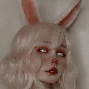 a woman with white hair and bunny ears