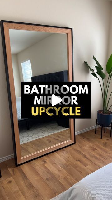 a bedroom mirror upcycled with the words bathroom mirror upside down