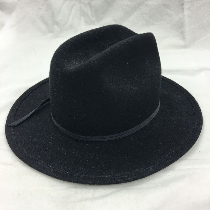 "Vintage Black Wool Felt Hat. Size Medium WPL 4384 USA John R. Craighead, Denver, CO. Hat. 21 1/2\" Inside Rim. 6\" Tall. This hat is in great shape. It is clean and ready to use. A second item may not be added to this one for free shipping. Size: Medium Dimensions:  11 1/2\" X 12 3/4\" across hat brim                         6\" to top of hat                         21 1/2\" inside hat edge For other hats, jewelry and vintage items see:  www.VeryVictorianStudio.etsy.com. For sewing related item Flat Bill Black Hat For Rodeo, Fitted Wide Brim Hat, Solid Brimmed Rodeo Hats, Adjustable Black Top Hat For Winter, Adjustable Black Top Hat With Wide Brim, Black Felt Hat With Curved Brim, Black Fedora With Curved Brim For Rodeo, Black Top Hat For Fall Rodeo, Black Brimmed Fedora For Rodeo