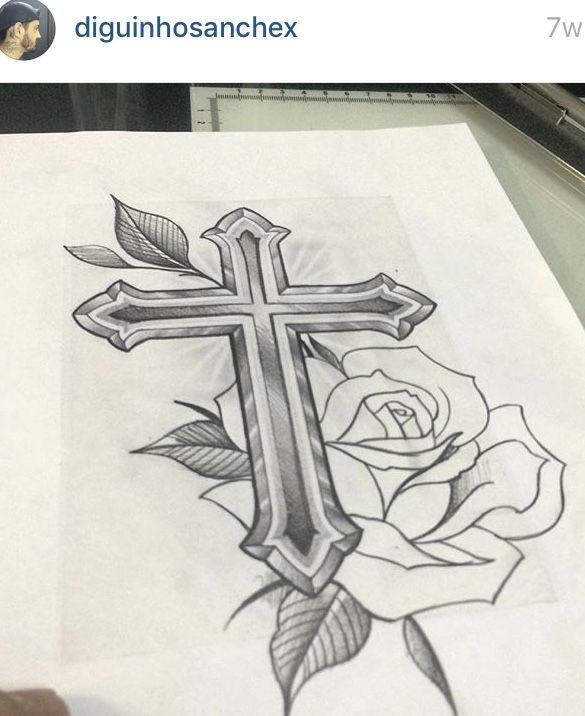 a drawing of a cross with a rose on it