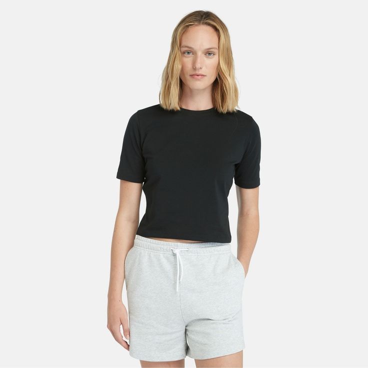 This women's cropped t-shirt is extra comfy thanks to fabric made with a hint of stretch and 95% organically grown cotton free of genetically modified seeds, synthetic fertilizers or pesticides. This easy, breezy silhouette looks cute with everything in your closet, so you'll find yourself styling it with shorts, skirts, overalls and joggers all season long. Casual Fitted Cropped T-shirt For Loungewear, Basic Stretch Cropped T-shirt For Loungewear, Basic Boxy Fit Cropped T-shirt, Basic Boxy Fit Cropped Tops, Basic Boxy Fit Crop Top With Crew Neck, Basic Cropped Solid Color T-shirt, Basic Cropped T-shirt, Casual Stretch Cotton Cropped Shirt, Basic Relaxed Fit Cropped T-shirt