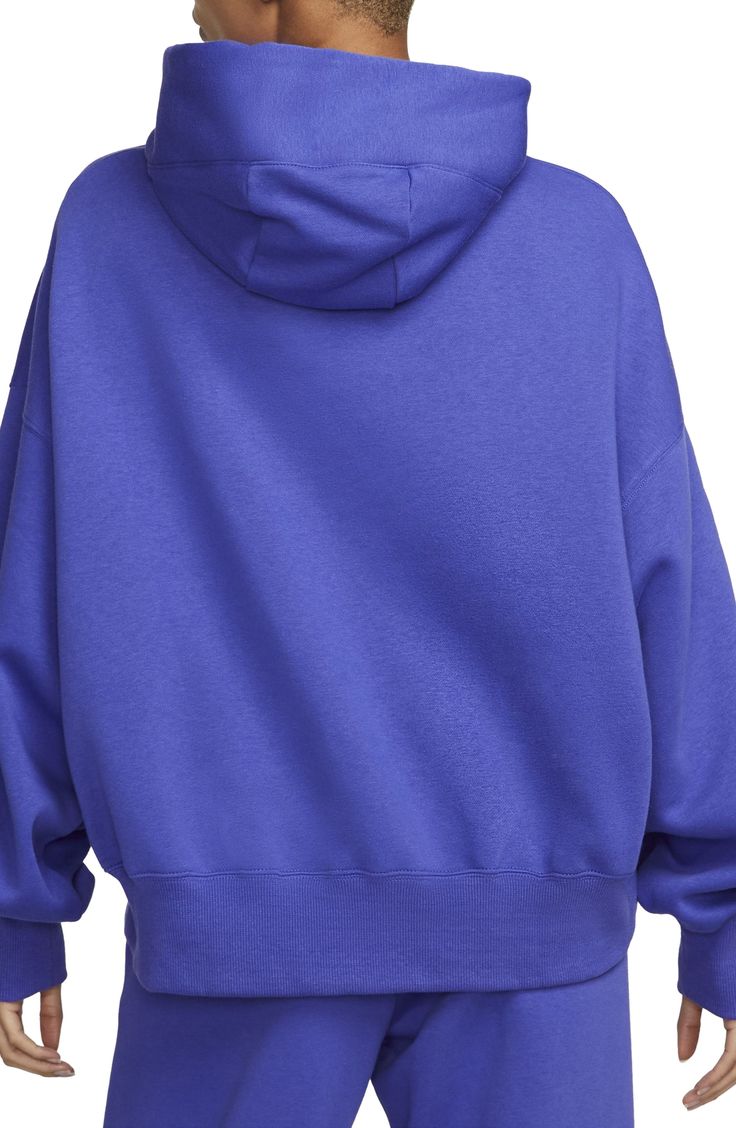 Supersoft fleece means all-day comfort in a dropped-shoulder hoodie perfect for relaxing at home or heading to the gym. Drawstring hood 80% cotton, 20% polyester Machine wash, line dry Imported Comfy Hooded Sweatshirt For Workout, Nike Fleece Hoodie For Gym, Cozy Nike Cotton Sweats, Oversized Workout Hoodie With Drawstring Hood, Cozy Cotton Nike Sweats, Oversized Hoodie With Drawstring For Workout, Oversized Hoodie With Drawstring Hood For Workouts, Comfortable Hooded Sweatshirt For Workout, Workout Hoodie With Drawstring Hood