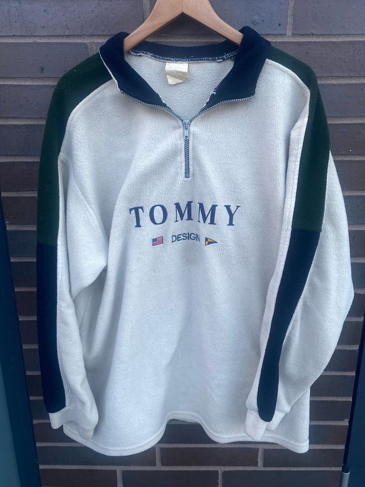 "Vintage 1990s Tommy Hilfiger Quarter Zip Fleece Sweatshirt - Size L (Length 29\" Chest 23\")  - Overall great vintage condition - No holes no stains - Message for more information Please take note of the measurements listed as these are vintage clothes and may fit different than the tag size. Follow our page for more vintage clothing drops!" Vintage Fleece Winter Tops, Vintage Fleece Tops For Winter, 90s Style Winter Tops With Embroidered Logo, 90s Style White Sweatshirt For Winter, Tommy Hilfiger Outfits, Tomy Hilfiger, Vintage Quarter Zip, Vintage Nike Jacket, 90s Tommy Hilfiger