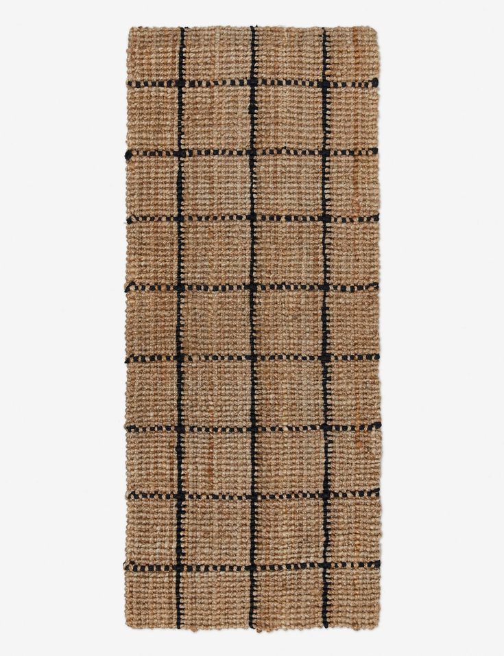 a brown and black rug on a white background