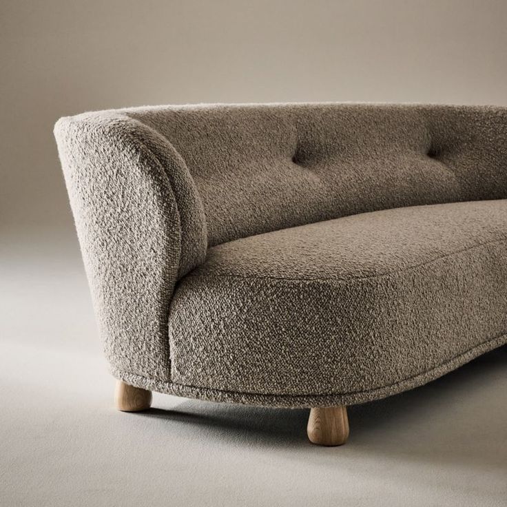 Generously cushioned to hug you as you sit, the Leonne long settee by goop features soft curves of custom wool-blend boucle for a grand statement on a small scale. The sweeping curved back, tufted buttons and teardrop-shaped American white oak legs certified sustainable by the Forest Stewardship Council r FSC come together for a piece that is elevated and timeless. Designed for small spaces, the sophisticated settee is also perfect for creating intimate seating in larger rooms. CB2 exclusive.  - Boucle Sectional Sofa, Natural Linen Sofa, Precedent Study, Boucle Cushion, Leather Sectional Sofa, Showroom Design, Linen Sofa, Curved Sofa, Old Fashioned Glass