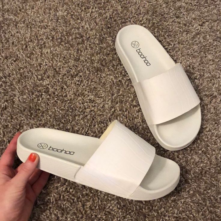 Never Worn White Textured Sole Sandals For Vacation, Synthetic Summer Slides With Round Toe, White Sandals With Textured Sole For Spring, Synthetic Round Toe Slides For Summer, Summer Slides With Round Toe In Synthetic Material, Summer Slides With Round Toe In Synthetic, Summer Synthetic Closed Toe Slides, White Slide Wedge Sandals For Spring, Open Toe Synthetic Slides For Day Out