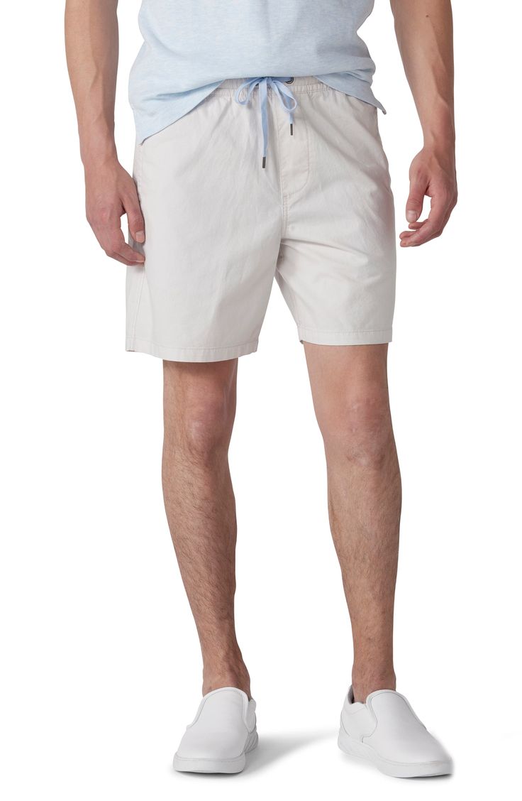 A smocked drawstring waist means a flexible fit in these sun-ready shorts that are made from stretch-enhanced cotton. 7" inseam; 24" leg opening; 12 1/4" front rise; 15" back rise (size Large) 98% cotton, 2% elastane Machine wash, line dry Imported Cotton Beach Shorts With Drawstring, Beach Cotton Shorts With Drawstring, Casual Cotton Swim Trunks With Built-in Shorts, Cotton Shorts With Elastic Waistband For Warm Weather, Warm Weather Cotton Shorts With Elastic Waistband, Beach Season Cotton Shorts With Drawstring, Summer Cotton Shorts For Poolside, Cotton Drawstring Shorts For Beach Season, Casual Swim Trunks With Elastic Waistband