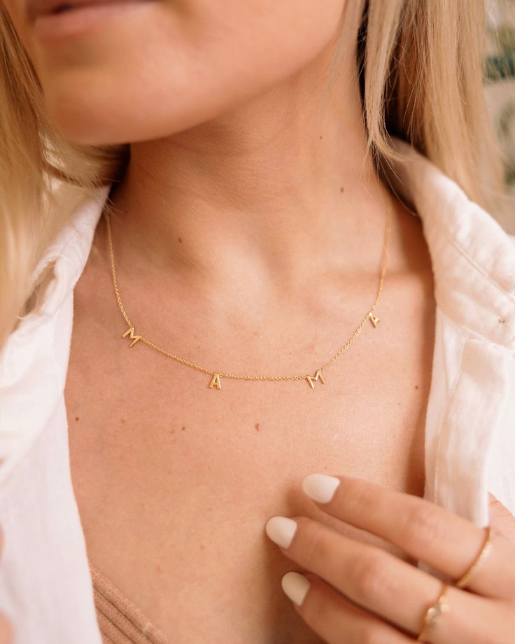 Add a personal touch and cherish the special moments with our Mama Necklace. A dainty letter necklace that can be worn alone or layered with any of our other dainty chain necklaces.Whether you're expecting, already have a little one, or know someone that's going to be, our Mama Necklace is the sweetest gift. Details: -Gold Filled, Sterling Silver -16" + 2" extender -Hypoallergenic, Tarnish Free, Waterproof Dainty Everyday Initial Pendant Necklace, Dainty Everyday Initial Pendant Name Necklace, Dainty Everyday Name Charm Necklace, Meaningful Custom Name Necklaces For Everyday, Dainty Name Charm Necklace For Everyday, Custom Name Necklace For Everyday Use, Dainty Everyday Necklaces With Initials, Delicate Everyday Custom Name Necklaces, Delicate Custom Name Necklaces For Everyday