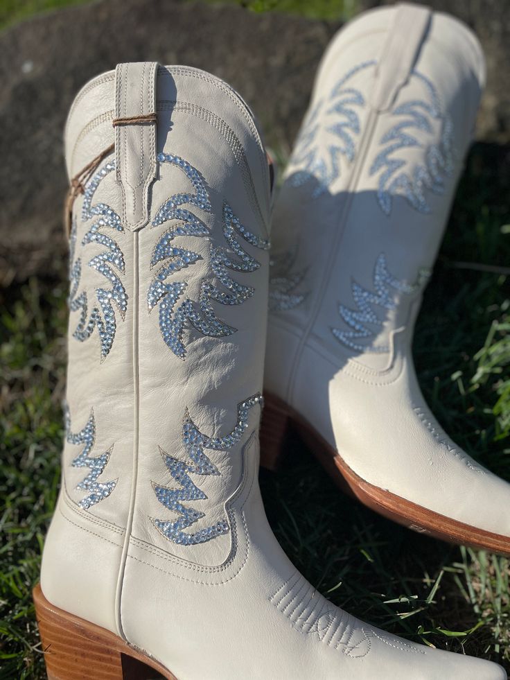 "Tecova's  Women's Cowboy Boots - perfect to dress up a boho wedding or glam cowboy boots.  I wish I had these as Bridal Cowboy Boots for my wedding, would be amazing wedding reception shoes or wedding ceremony shoes.  ** choose either pearl or crystal - color variations are available and customizations are possible please message me https://www.tecovas.com/products/the-annie?variant=38164775731395 they come in many different colors This snip toe cowgirl boot has a 2\" heel and 14\" shaft. The Annie is made from soft bovine or water-resistant suede from top to bottom. - These are soft leather. Wedding cowboy boots @Sonaichic__ on IG and TikTok @Soniachicc on FB @Soniachic on Pinterest   for more content!" Sparkle Cowboy Boots, Glam Cowboy, Wedding Reception Shoes, Bridal Cowboy Boots, Cheap Cowgirl Boots, Rhinestone Cowboy Boots, Snip Toe Cowgirl Boots, Wedding Cowboy Boots, Blue Cowboy Boots