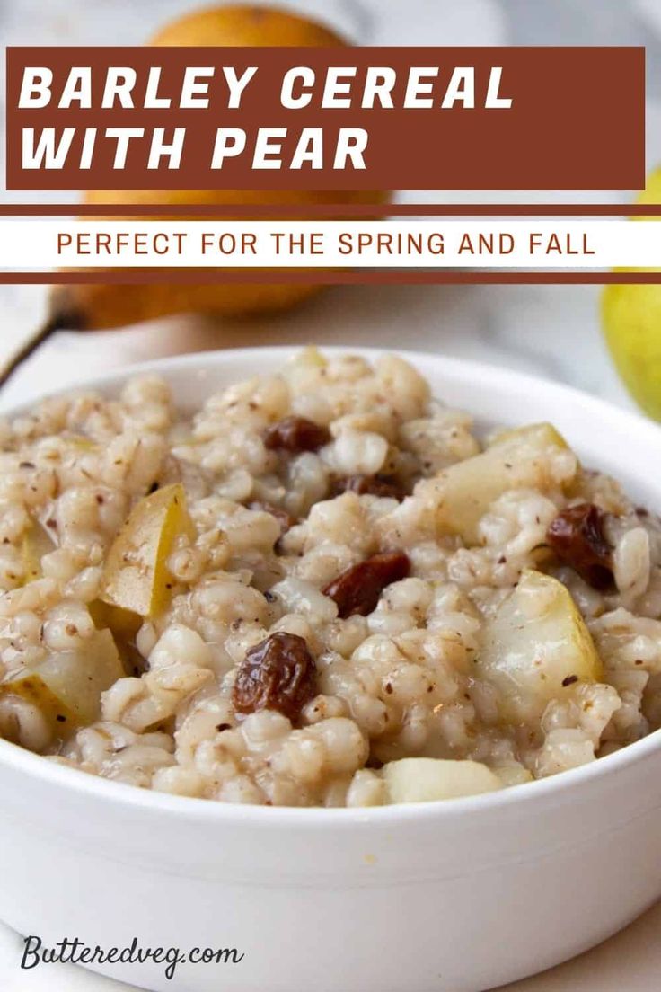 barley cereal with pears in a white bowl next to an orange on the side