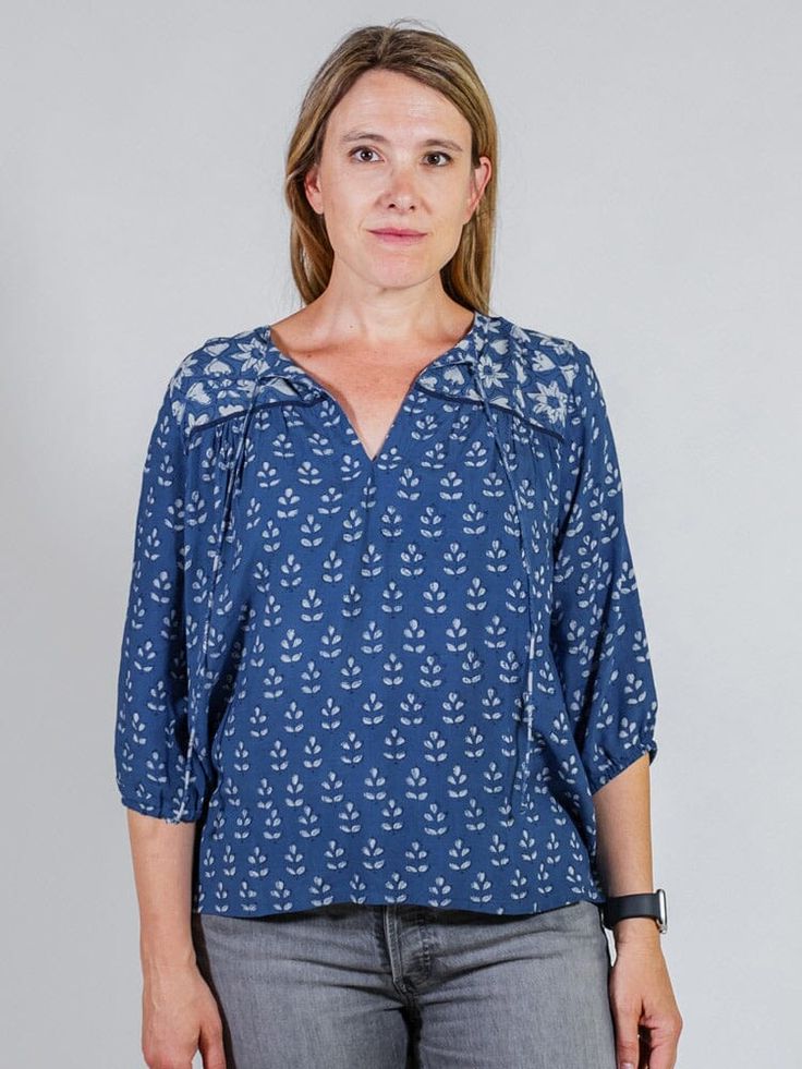 Made with 100% Modal Hand block print Tie detail at neckline Length of size M is 25.5" Made at a fair trade women's cooperative in India This modal top is more than just eye-catching. Get a closer look and find a block printed botanical design and hand stitching, along with a tie at the neck. Pair with denim for an effortless look with just a touch of boho. This textile has been printed by hand using traditional techniques. Care: The best option for all Mata pieces is to hand wash in cold water Sleeveless Cotton Dress, Fair Trade Clothing, Ethical Fashion Brands, Botanical Design, Hand Block Print, Women Artisans, Tier Skirt, Printed Ties, Tiered Dress