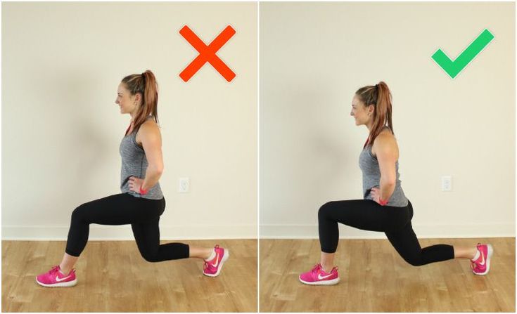 a woman doing squats with the help of an exercise sign above her head and bottom half - body