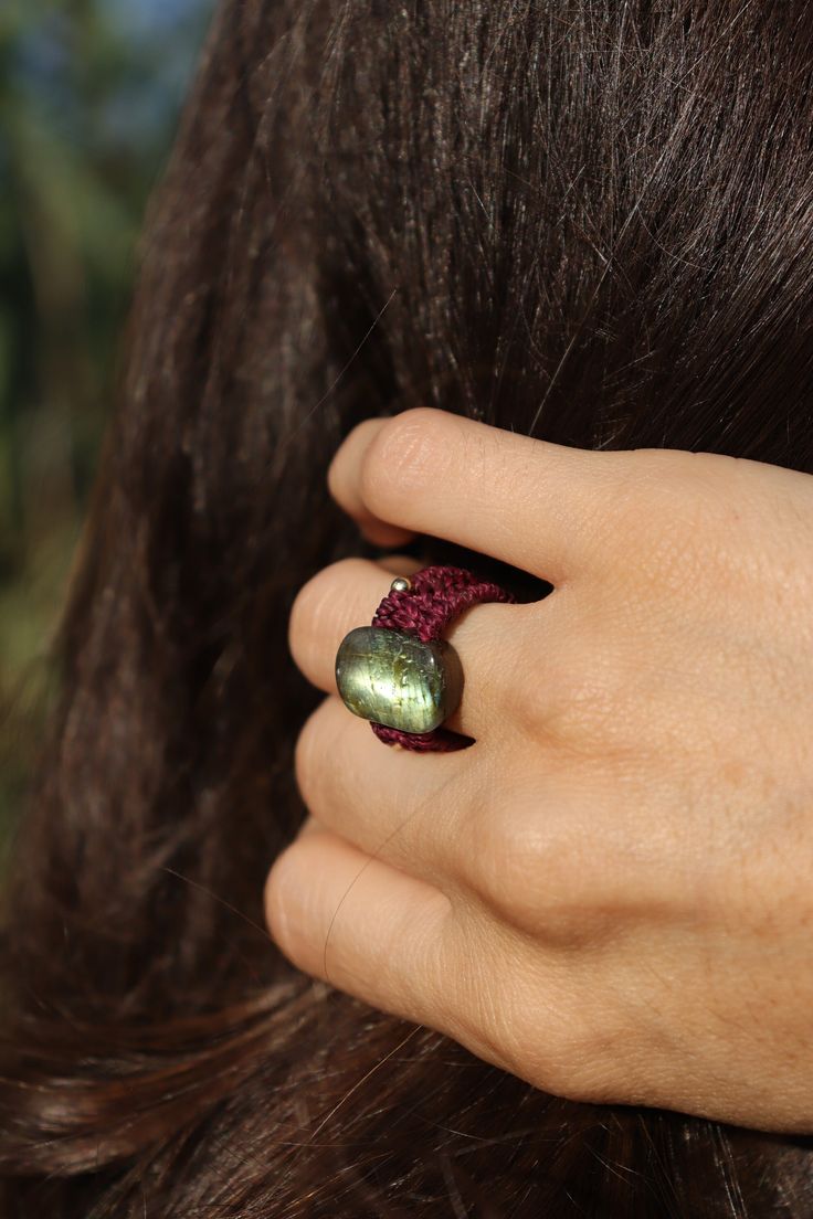 Beautiful rings with gemstone, you can choose between labradorite and tourmaline. Every mineral is different, and especially about labradorites, they have different shiny colours (from blue to yellow to green).  The rings fit for 5.5 cm diameter finger, and they tend to get a little loose with time.  It's better to take it off when you wash your hands so the ring lasts for more time.  MATERIALS:  -Gemstone: labradorite or tourmaline -High quality Brazilian waxed thread: durable, washable, waterproof, resistant.  -Beads -No glue PACKAGING & SHIPMENT:  All the jewels are sent in a cloth bag and a protective packaging so they arrive perfect to you. I like to add always a little present for you like tea bags, and I give you a 10% discount for your next order.  If your country is not included i Bohemian Adjustable Hand Wrapped Rings, Adjustable Moonstone Rings With Natural Stones, Earthy Handmade Rings For Gifts, Handmade Earthy Style Rings As Gifts, Handmade Earthy Rings As Gifts, Earthy Handmade Rings As Gifts, Bohemian Adjustable Crystal Ring As Gift, Handmade Adjustable Moonstone Crystal Ring, Bohemian Moonstone Ring As A Gift