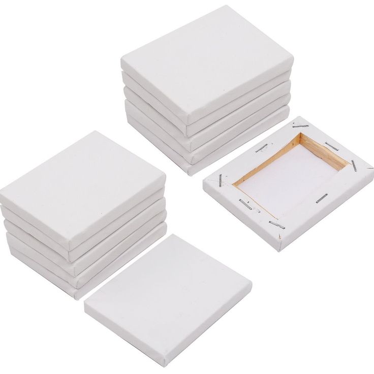 six white square coasters stacked on top of each other with a wooden frame in the middle