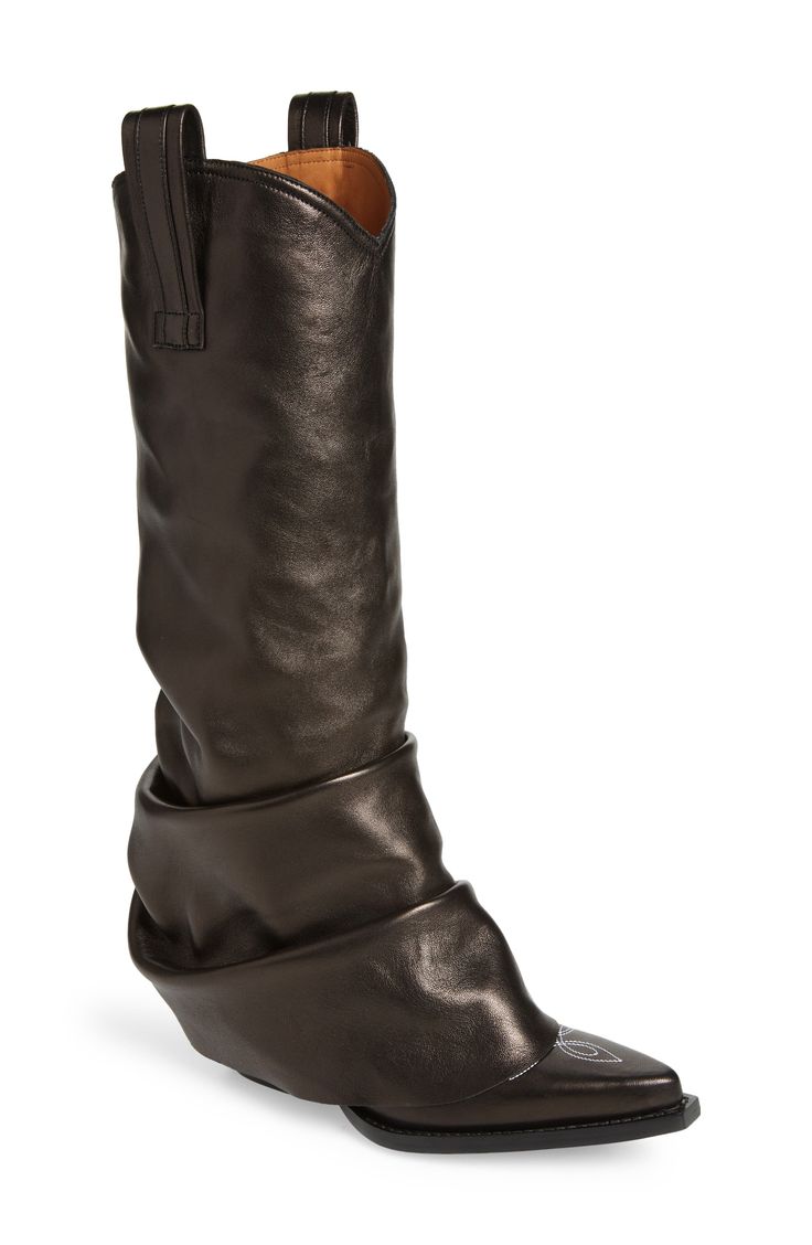 A tonal sleeve overlay adds an insouciant slouchiness to this calfskin cowboy boot featuring classic details like a stacked heel and ornate topstitching. 2 1/4" heel (size 39) 15" shaft; 14 1/4" calf circumference Pull-on style Leather upper, lining and sole Made in Italy SPACE: A shop for emerging and advanced designers Shark Boots, Leather Weave, Woven Shoes, Cowboy Boots Women, Cowboy Boot, Leather Sleeve, Red Suede, Dream Shoes, Black Leather Boots