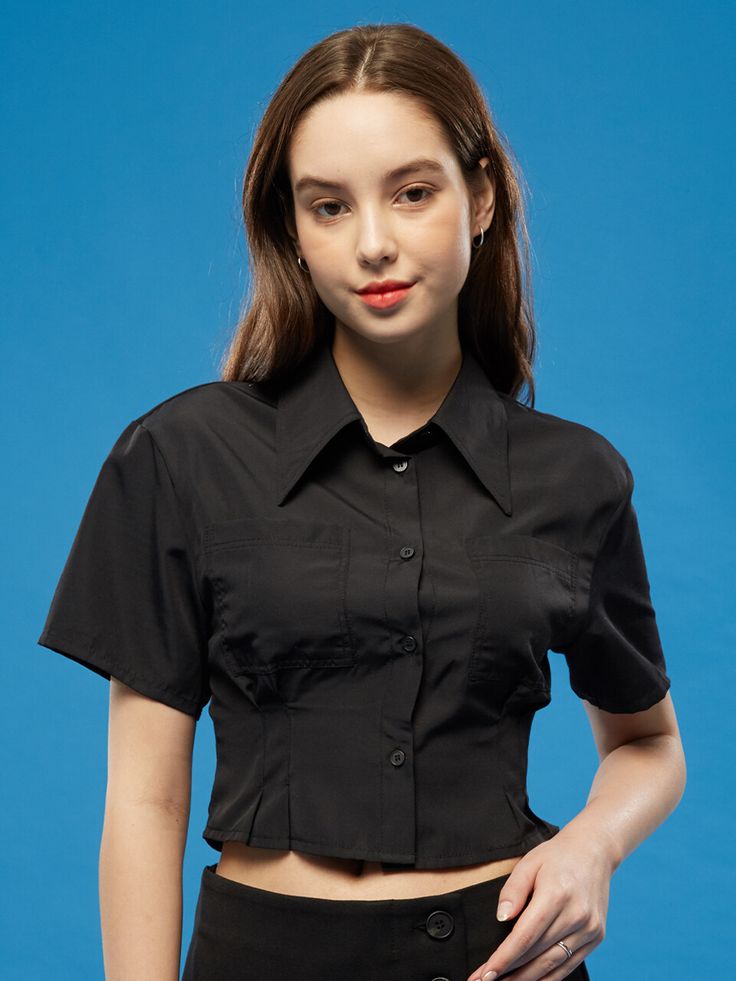 Editor's NotesKOLEAT's trendy yet versatile cropped shirt. Good to be worn in the summer season as layered or alone.- Button closure- Cropped length- Pocket on the chest- Slim silhouette- Versatile and trendy itemMeasurements(in.)One size- Total length: 16.92 in.- Shoulder: 16.14 in.- Chest: 16.73 in.- Hem: 7.48 in.Model infoWoman - Height: 5'74Composition & Care- 100% Nylon- Please check the care labelDesigner- by KOLEAT Chic Fitted Cropped Shirt With Short Sleeves, Fitted Cropped Shirt With Button Closure, Chic Fitted Short Sleeve Cropped Shirt, Trendy Collared Cropped Shirt With Buttons, Fitted Cropped Shirt For Work, Fitted Button-up Crop Top For Work, Trendy Collared Crop Top For Summer, Trendy Fitted Crop Top Shirt, Trendy Cropped Shirt For Work