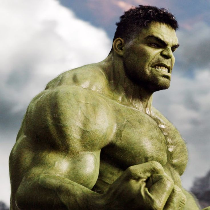 the incredible hulk man with purple hair is shown in front of a cloudy blue sky