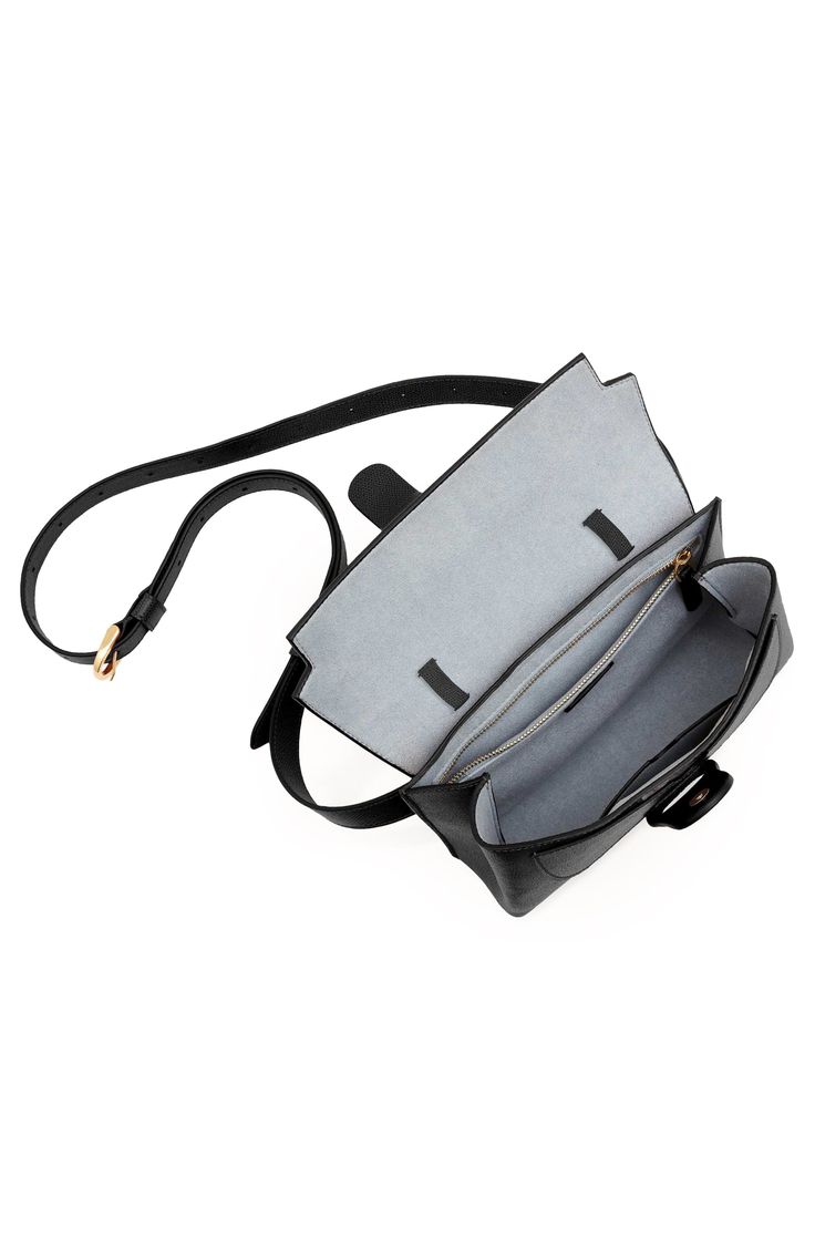 More than an elevated fanny pack, the Aria Belt Bag can fit any size phone, wallet, and other essentials. With exterior and interior loops, and an adjustable, removable leather strap, the Aria can be worn 5 ways: as a belt bag, a crossbody, a shoulder bag, a sling bag, or a clutch. Wear 5 Ways: Belt Bag, Sling, Shoulder, Crossbody, Clutch Scratch & water-resistant Italian Pebbled leather What Fits: Any size phone; card slots, interior zip pocket for essentials Removable and adjustable leather st Crossbody Saddle Bag With Cell Phone Pocket For On-the-go, Luxury Top Handle Belt Bag For Everyday Use, Leather Belt Bag With Cell Phone Pocket For On-the-go, Travel Belt Bag With Detachable Strap And Top Handle, Leather Phone Bag With Removable Pouch For On-the-go, Everyday Top Handle Belt Bag With Detachable Strap, Versatile Belt Bag With Detachable Strap, Modern Rectangular Belt Bag For On-the-go, Luxury Travel Flap Bag With Mobile Phone Pocket