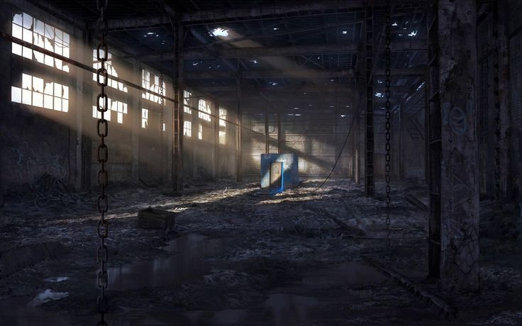 an abandoned building with sunlight coming through the windows and on the floor, there is a blue object in the middle of the room