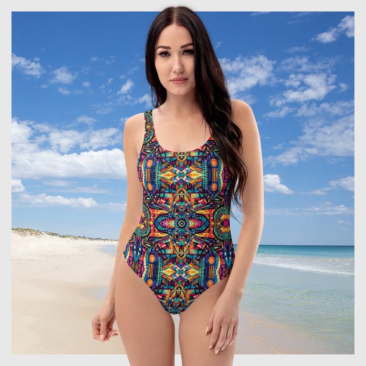 This Women's Cheeky One-Piece Swimsuit/Bathing Suit for all figures will bring out your best features. Enjoy the smooth fabric and the Unique & Colorful Abstract Tribal Design, and show it off by the beach or pool! Sizes XS-Plus Size available. * 82% Polyester, 18% Spandex * Fabric weight: 6.78 oz/yd² (230 g/m weight may vary by 5% * Chlorine-resistant fabric * Cheeky fit with a scoop neckline and a low scoop back * Zig-zag stitching * Double-layer front  * Four-way stretch material stretches an One-piece Tankini For Sunbathing During Beach Season, Multicolor Stretch Swimwear For Vacation, Tropical One-piece Swimwear For Sunbathing, Bold Print Beachwear Swimwear For Pool, Bold Print Swimwear For Poolside, Vibrant Stretch Swimwear For Beach, Vibrant Stretch Swimwear For Sunbathing, Bold Print Beachwear For Sunbathing, Bold Print Beachwear For Pool