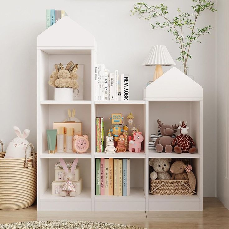 a white book shelf filled with lots of books