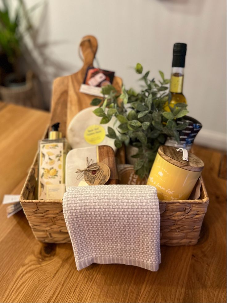 a wooden table topped with a basket filled with food