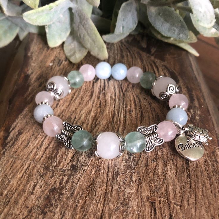 We've created this fertility bracelet with hormone regulating in mind. In it's design we've used the most well known gemstones for the balancing of hormones. Moonstone is often used for fertility and infertility as it is said to regulate a woman’s menstrual cycle and boost female energy. In addition Moonstone is used to promote grounding, protection, sleep, luck, selflessness, hope, clarity, and safe childbirth. Fluorite is key for assisting to stabilize hormonal changes such as PMS, PCOS and me Rose Quartz Bracelet For Meditation, Holistic Rose Quartz Jewelry For Healing, Rose Quartz Gemstone Bracelet For Meditation, Silver Rose Quartz Beaded Bracelets For Healing, Healing Rose Quartz Jewelry, Healing Rose Quartz Gemstone Bracelets, Healing Rose Quartz Bracelets With Natural Stones, Healing Rose Quartz Natural Stones Bracelet, Meditation Rose Quartz Crystal Bracelet With Natural Stones