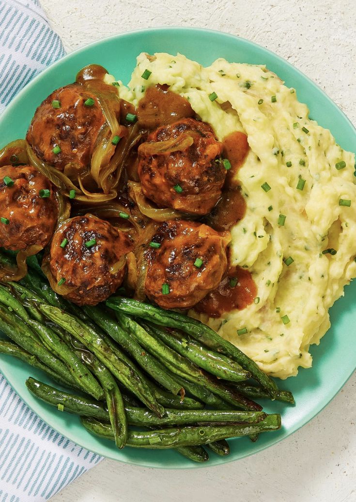 meatballs, mashed potatoes and green beans on a plate