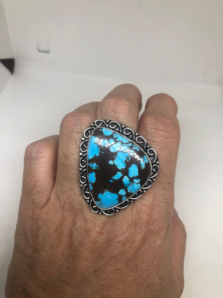 Large genuine blue Turquoise Vintage ring Low content silver not sterling. Size 10 Can be re sized at my jeweler. $10-$20 All rings are shipped free in the US in a nice gift box. Check out our over a THOUSAND great reviews Engraving is $4 per letter and is not always perfect depending on the piece. It can take a few days if the jeweler is busy. This is payable to Paypal Judithsltd@gmail.com Collectible Round Turquoise Ring, Collectible Turquoise Jewelry With Large Stone, Handmade Blue Turquoise Ring For Collectors, Unique Turquoise Jewelry For Anniversary, Southwestern Style Blue Jewelry With Large Stone, Southwestern Blue Jewelry With Large Stone, Southwestern Blue Large Stone Jewelry, Southwestern Blue Jewelry For Anniversary, Turquoise Open Ring Jewelry As Gift