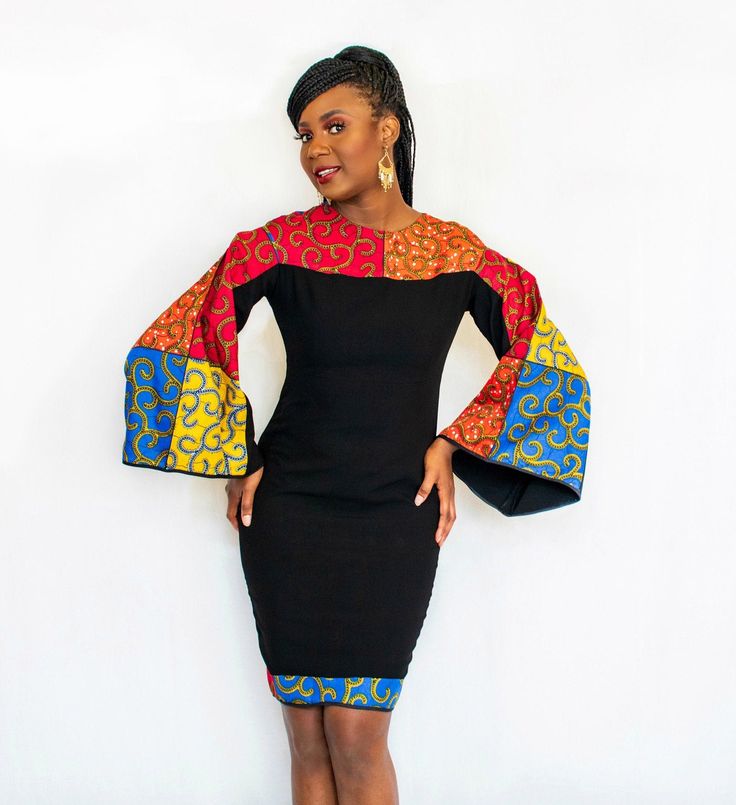 A classic, feminine style African dress, boat neckline, and body fitting. A versatile piece for your wardrobe.  *Made in Nigeria  *100% African wax cotton *Lined *Back zipper *Long sleeve *Body fitting Classic Feminine Style, Classic Feminine, Boat Neckline, Waxed Cotton, African Dress, Body Fit, Dress Clothes For Women, Feminine Style, Favorite Outfit