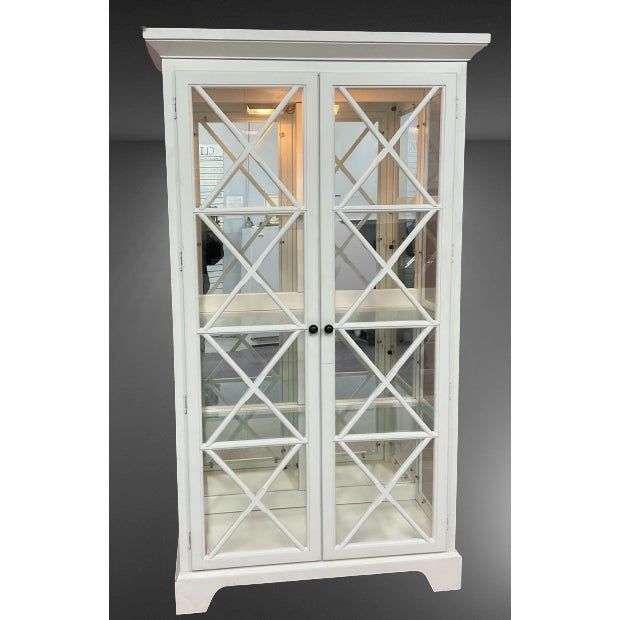 a white china cabinet with glass doors