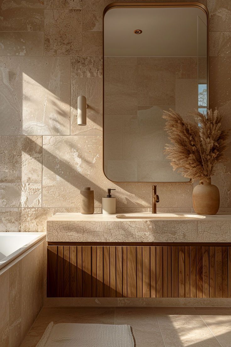 a bathroom with a sink, mirror and bathtub in front of a large window